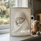 Newborn 3D Moment lithophane of baby Millie glowing on a nursery windowsill