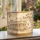 The family home as a 3D Moment, glowing on a windowsill